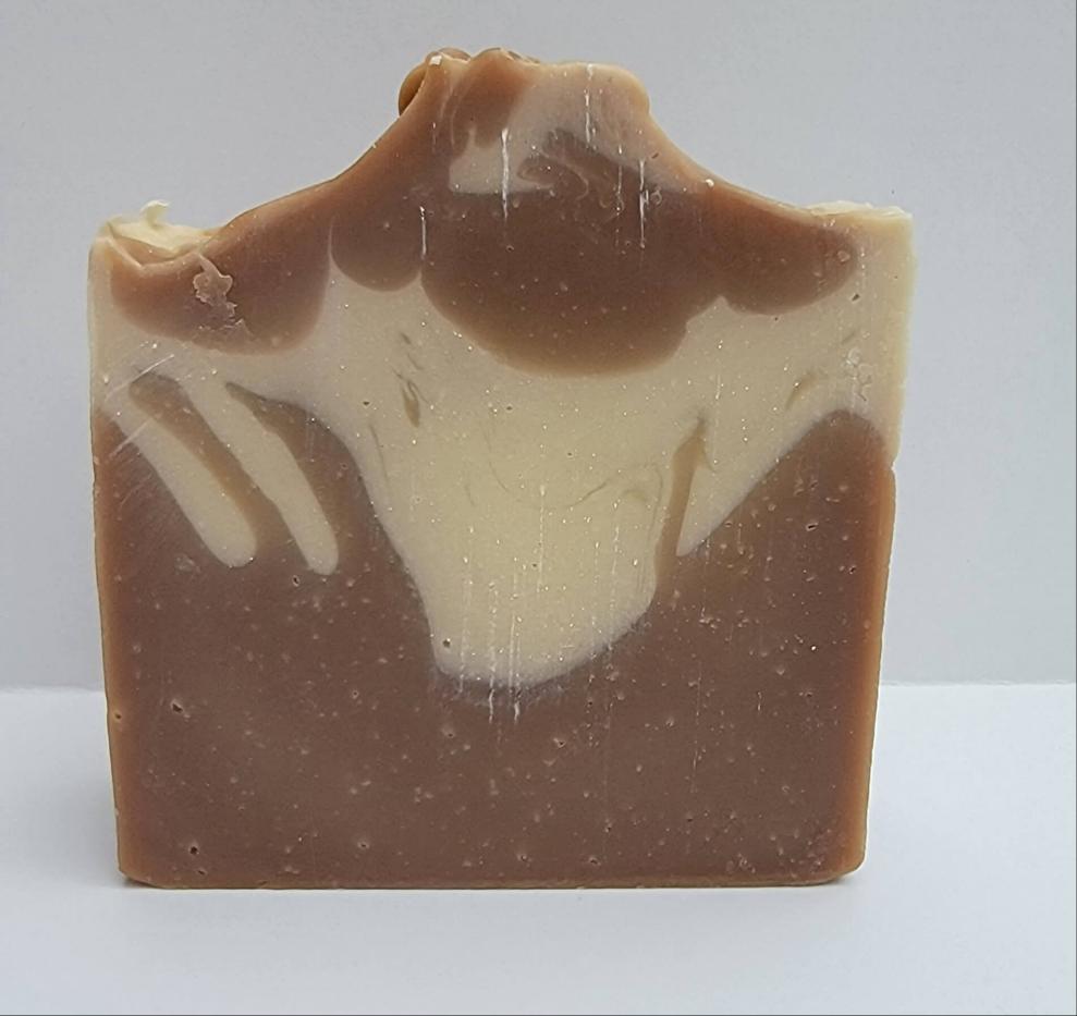 This handmade soap invites you to love the calming mix of Sandalwood and creamy Vanilla.